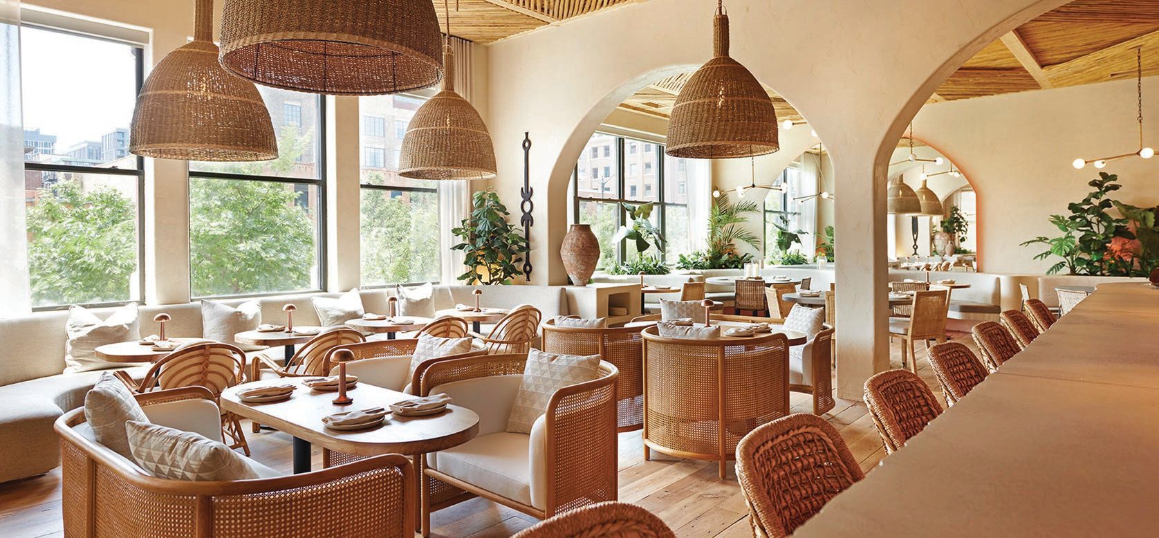 The dining room at Nisos boasts a sunny Mediterranean vibe PHOTO BY ANTHONY TAHLIER
